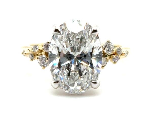 Oval Scattered Side Diamond Cluster Ring