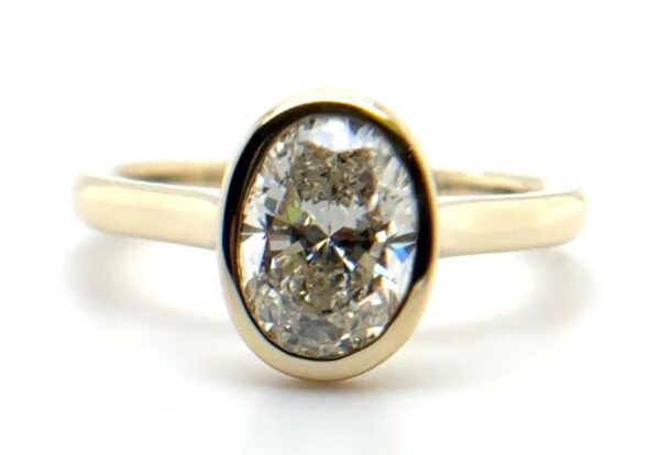Oval Bezel Solitaire Diamond Ring - Yellow Gold