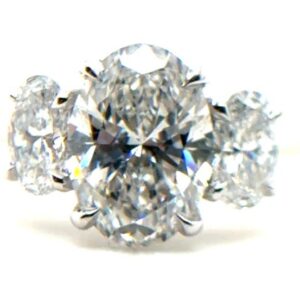 Three Stone Oval Diamond Ring - Yellow Gold